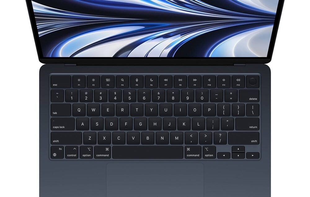 Laptop moderno con schermo astratto blu